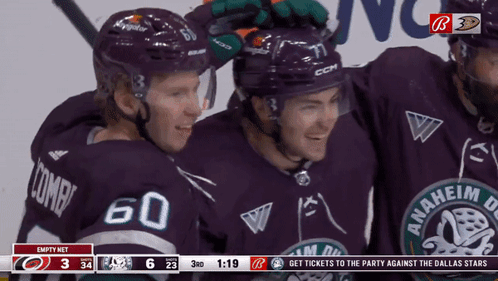 Hockey Players Posing With Ducks Logo GIF