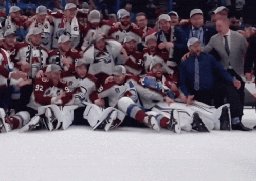Hockey Players Posing with Number 92