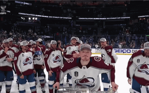 Hockey Players Posing With Trophy