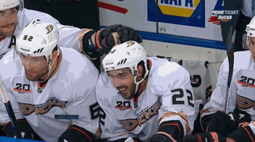 Hockey Players Sitting In Locker Room GIF
