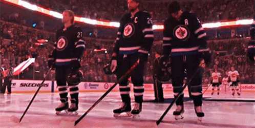 Hockey Players With C and A Jerseys