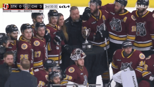 Hockey Team Posing With Trophy GIF