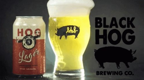 Hog Lager Can Next to Glass
