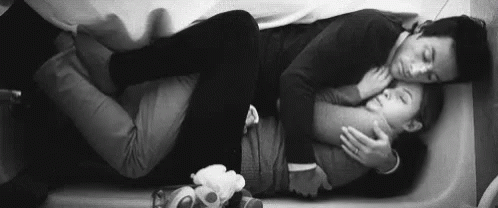 Couple Hold In The Sofa GIF