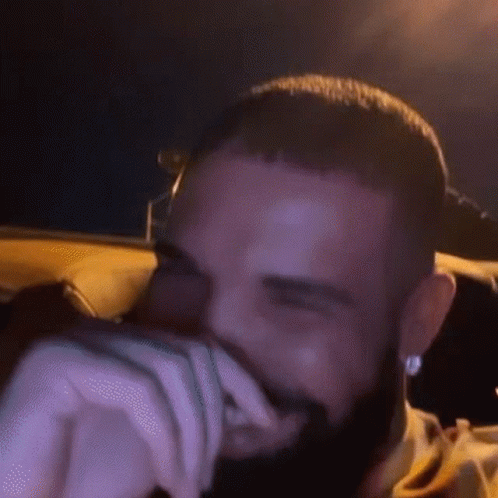 Holding In Laugh Drake The Rapper GIF