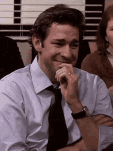 Holding In Laugh John Krasinski The Office GIF