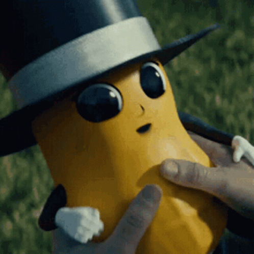 Holding Mister Peanut GIF
