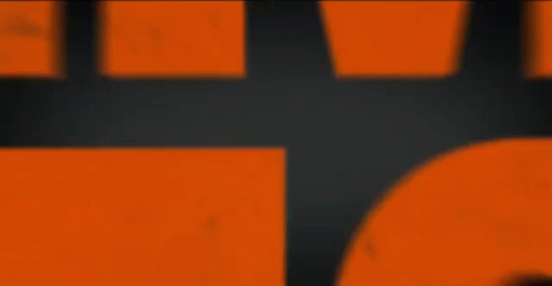 Holmes & Watson Orange Letters on Black Background
