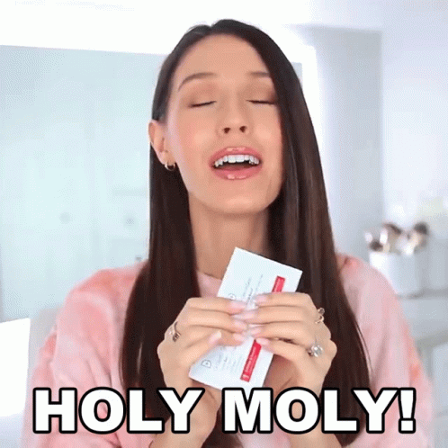 Holy Moly Girl Holding Ticket GIF