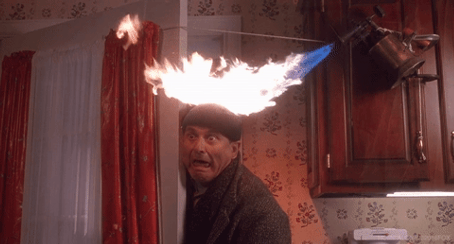 Home Alone Harry Lime's Hair Getting Burned GIF