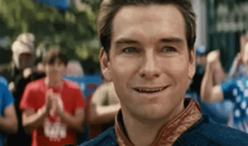 Homelander Fake Smile On Cheering Crowd GIF