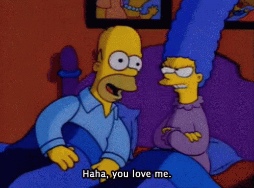 Homer Simpson And Marge Simpson Are Sitting On A Bed And Talking GIF