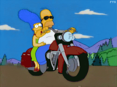 Homer Simpson And Marge Simpson Riding A Motorcycle GIF