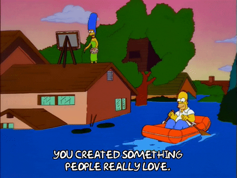 Homer Simpson Driving Boat In Monsoon Flood GIF