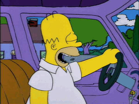 Homer Simpson Driving Purple Car With Smiley Face GIF