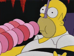 Homer Simpson Eating A Lots Of Donuts GIF