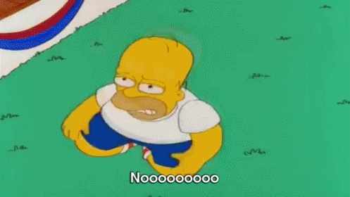 Homer Simpson Lying On Grass With Mouth Open GIF