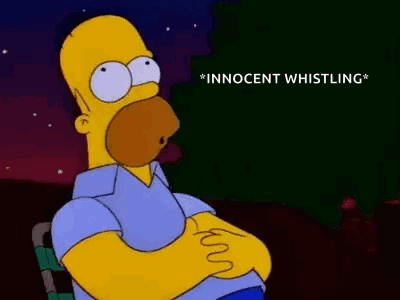 Homer Simpson From The Simpsons Is Sitting In A Chair With His Arms Crossed And His Mouth Open . GIF