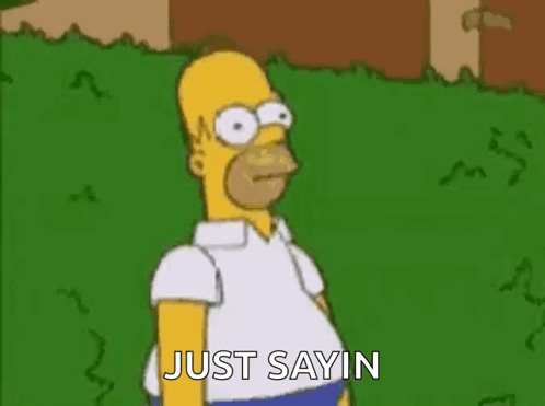 Homer Simpson From The Simpsons Is Standing In The Grass And Saying `` Just Saying '' . GIF