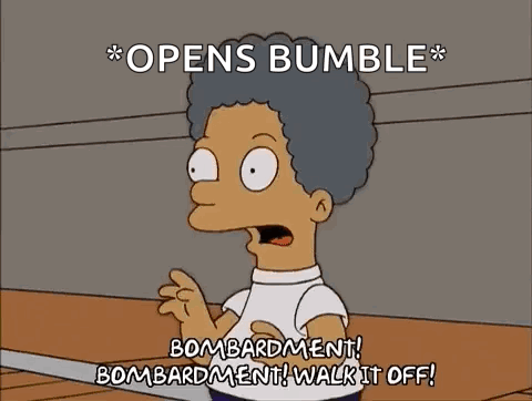 Homer Simpson Holding Boxing Glove And Pointing GIF