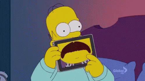 Homer Simpson Holding Tablet With Mustache Picture