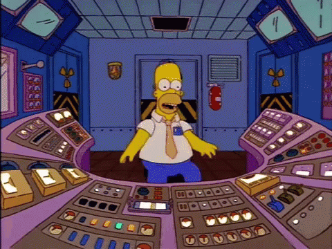 Homer Simpson In Control Room With Fire Extinguisher GIF