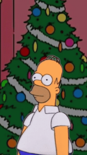 Homer Simpson In Front Of Christmas Tree With Decorations GIF