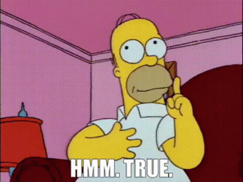 Homer Simpson Is Sitting In A Chair With His Finger Up And The Words Hmm True Below Him GIF