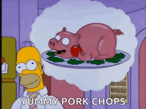 Homer Simpson Is Standing Next To A Plate Of Pork Chops With A Pig On It . GIF