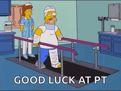 Homer Simpson Is Walking On Parallel Bars In A Hospital While A Nurse Stands Behind Him . GIF