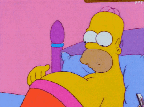 Homer Simpson Lying in Bed with Pink Blanket