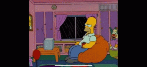 Homer Simpson Sitting In Bean Bag Chair With Soda GIF