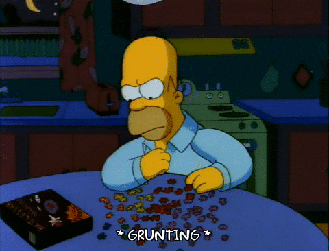 Homer Simpson Smashing Puzzle Pieces GIF