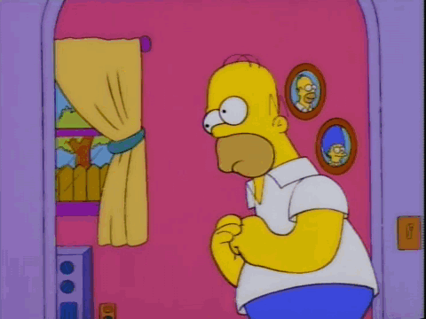 Homer Simpson Standing by Pink Door