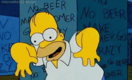 Homer Simpson Standing In Front Of Graffiti Wall GIF