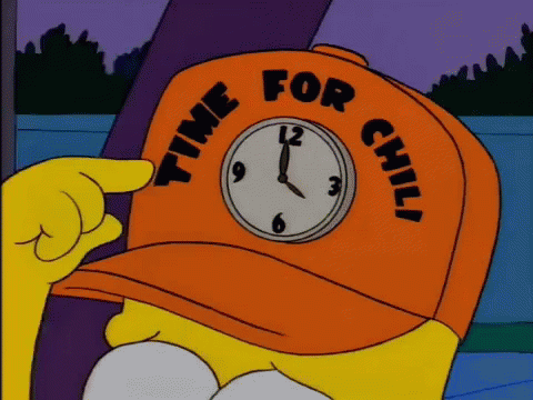 Homer Simpson Wears An Orange Hat That Says Time For Chili GIF