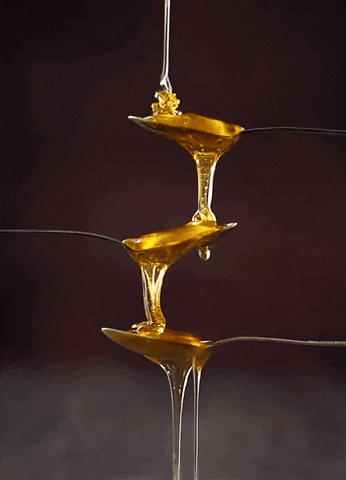 Honey On Spoons Continuous Pour GIF