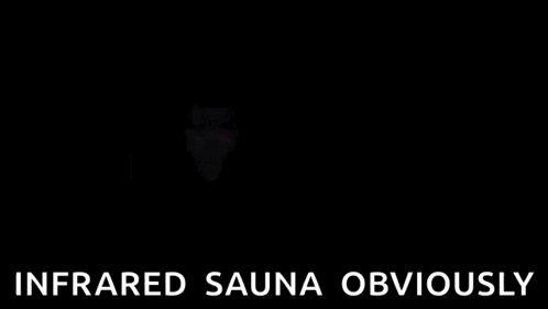 Hooded Cape Person in Red Light Saying Infrared Sauna Obviously