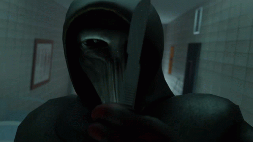 Hooded Figure Holding Knife