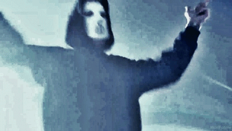 Hooded Person With Mask Dancing In Dark GIF