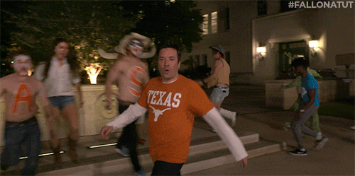 Hook Em Fan Painted Their Body Saying Texas GIF