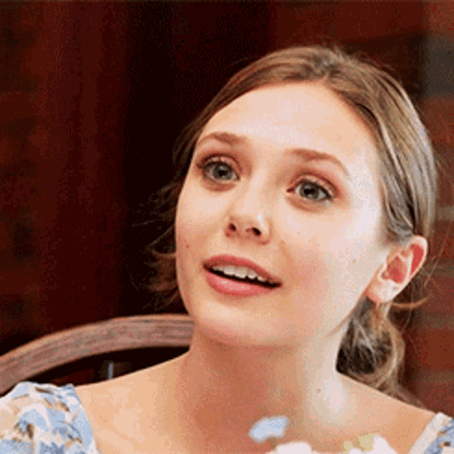 Hopeful Elizabeth Olsen Stare GIF