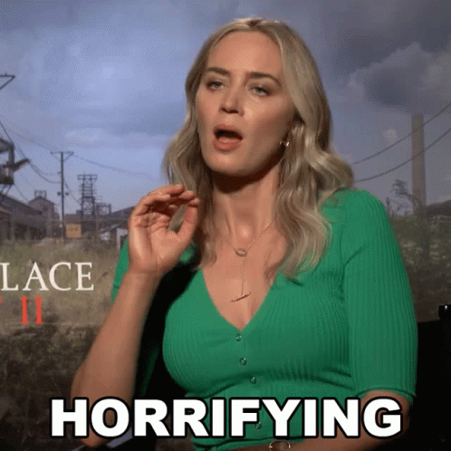 Emily Blunt In Green Blouse Is Horrified GIF