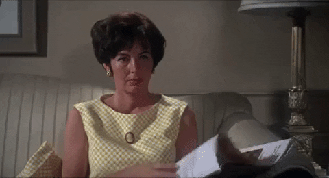 Horror Magazine Reading GIF