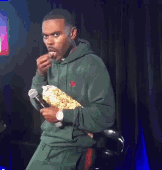 Host Enjoying Eating Popcorn GIF
