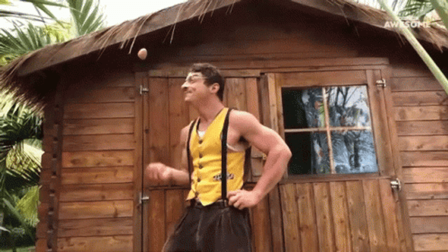 Hot Man Juggling Eggs GIF