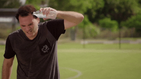 Hot Outside Man Dousing Self With Water GIF