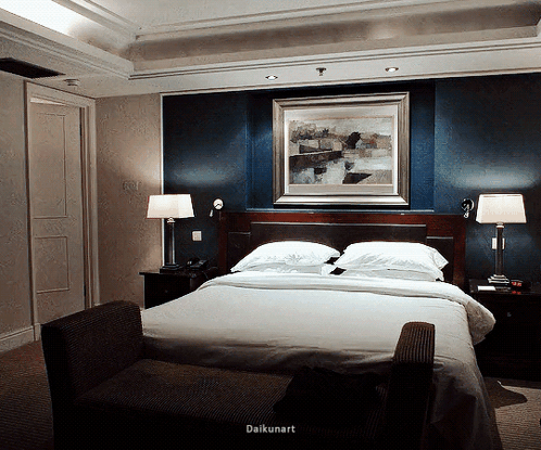 Hotel Room With Large Bed And Painting GIF