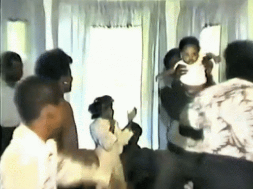 House Party Man Lifting Baby GIF