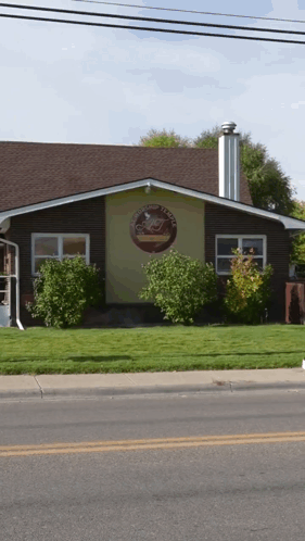 House With Coffee House Sign GIF